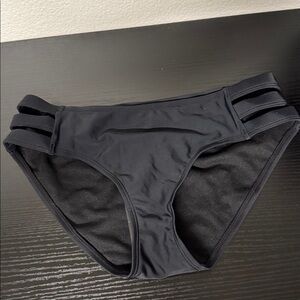 Ocean blues black bikini bottom with side cutouts